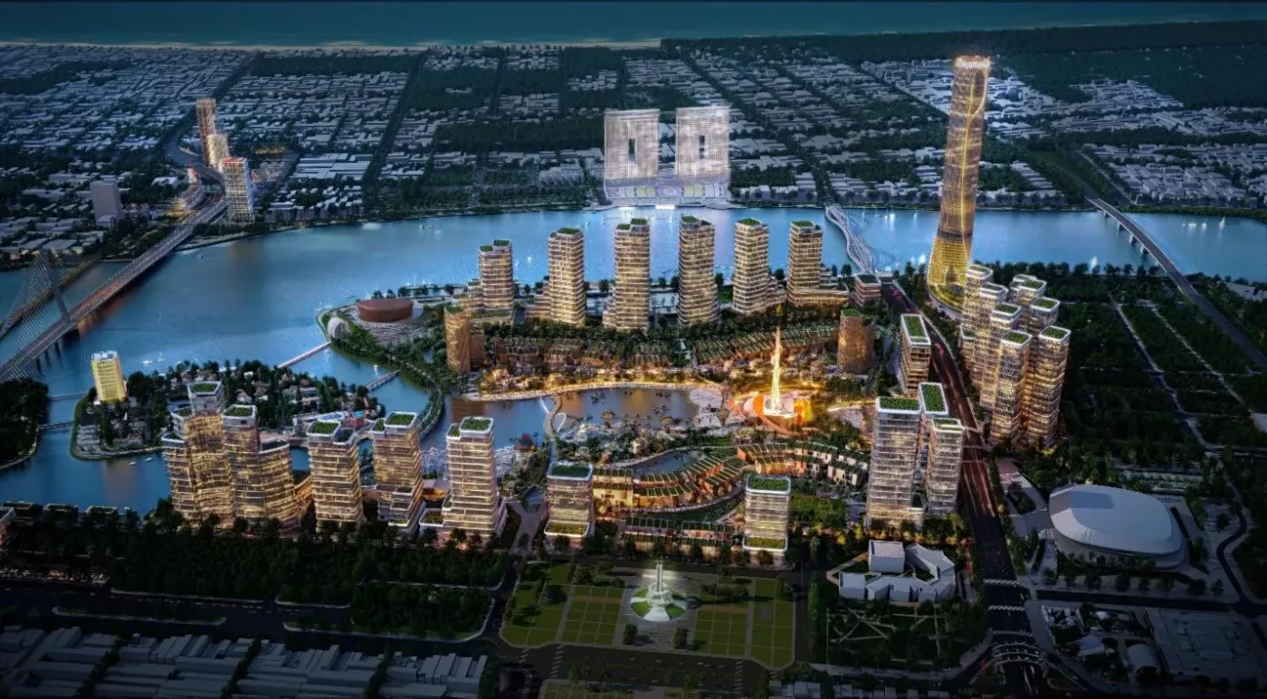Phối cảnh tổ hợp Da Nang Downtown của Sun Group bên sông Hàn về đêm, các tòa tháp sáng đèn