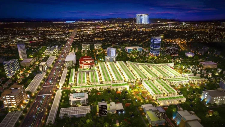 Phối cảnh ban đêm khu đô thị Green City Bình Dương với các dãy nhà liền kề mái xanh bên trục đường lớn