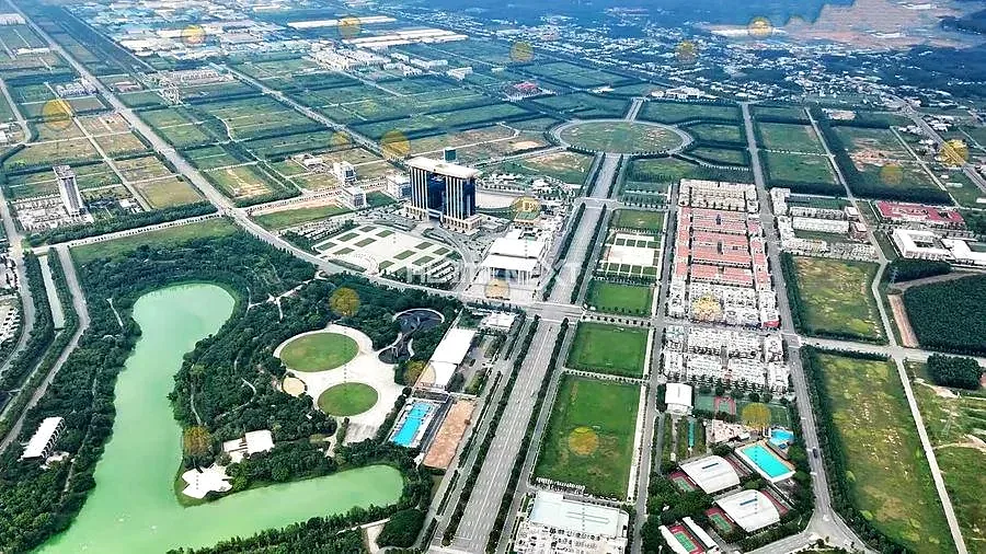 Toàn cảnh khu đô thị Thành phố mới Bình Dương nhìn từ trên cao với trục đường lớn, công viên và hồ nước